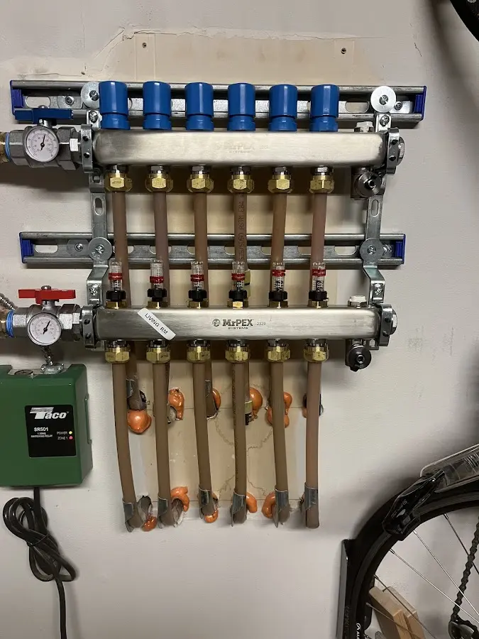 Plumber performing Water Heater Repair at a residential property in Los Ranchos de Albuquerque